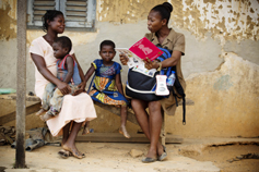 A community meeting is held to discuss health issues in Takradi, Ghana