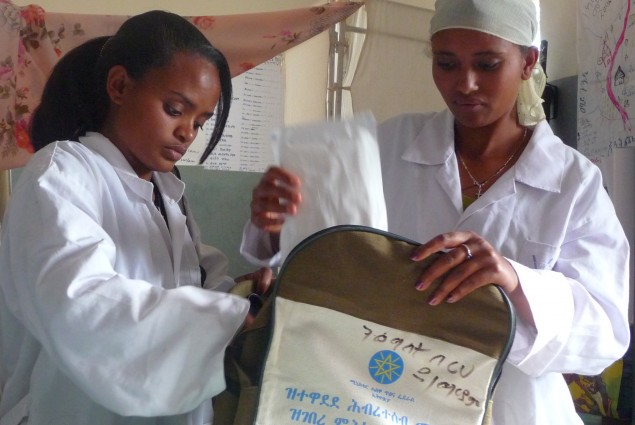 Health Workers Prepare for the Trek to a Village they Serve