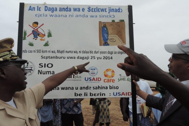 There is the toilet!! Mopti Governor and USAID Director pointing to it